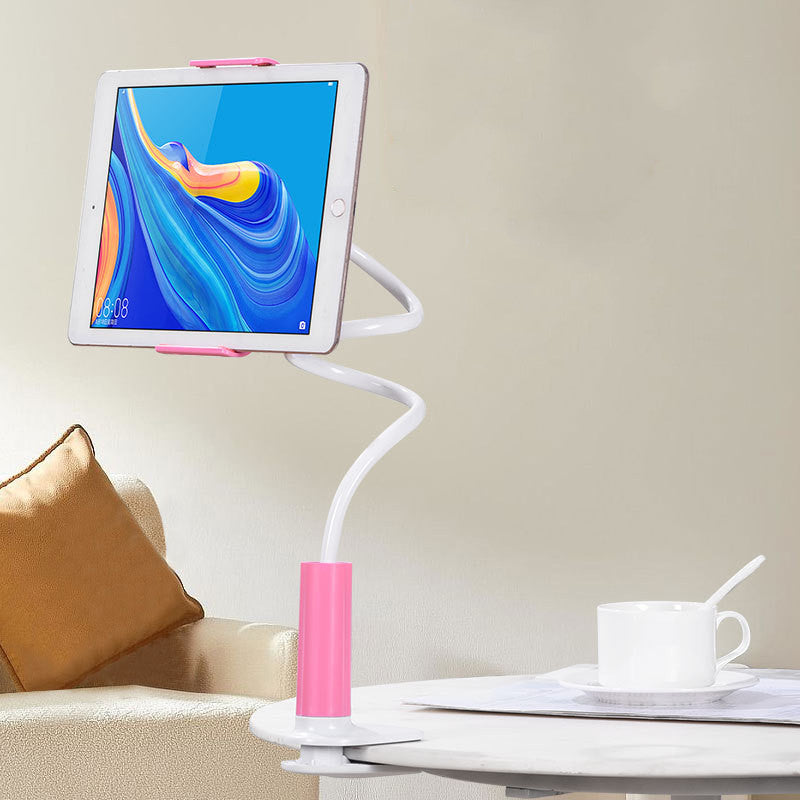 White flexible holder with a pink base clamped to a table and holding a tablet