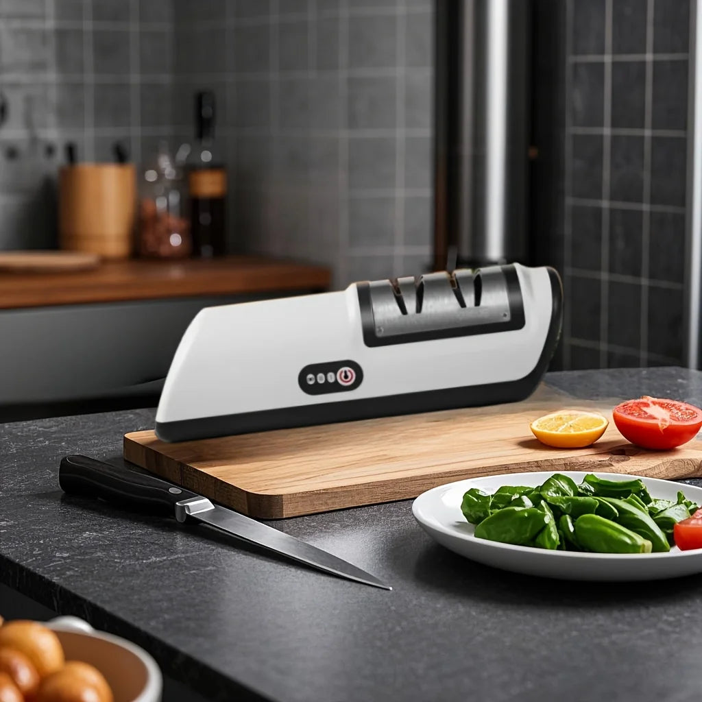 Compact white and black knife sharpener on a kitchen counter