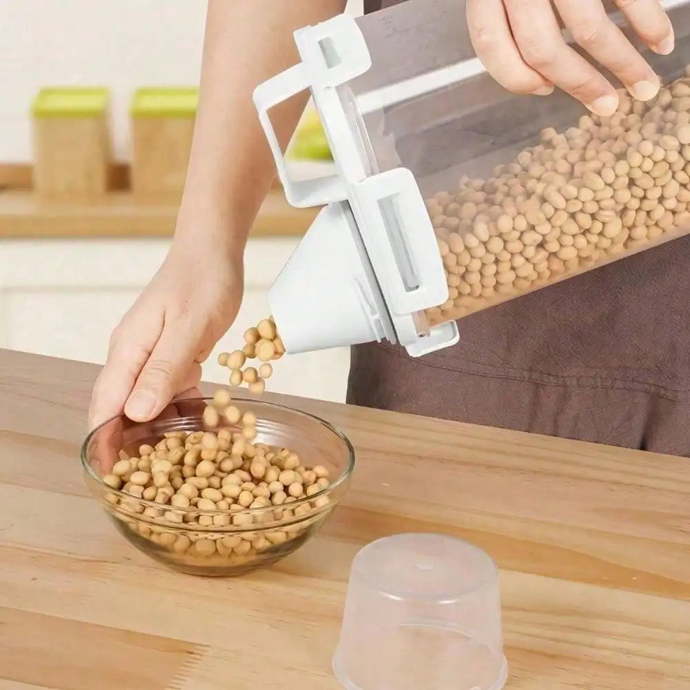 Alternate gallery view of a dry food container dispensing beans through its pour spout