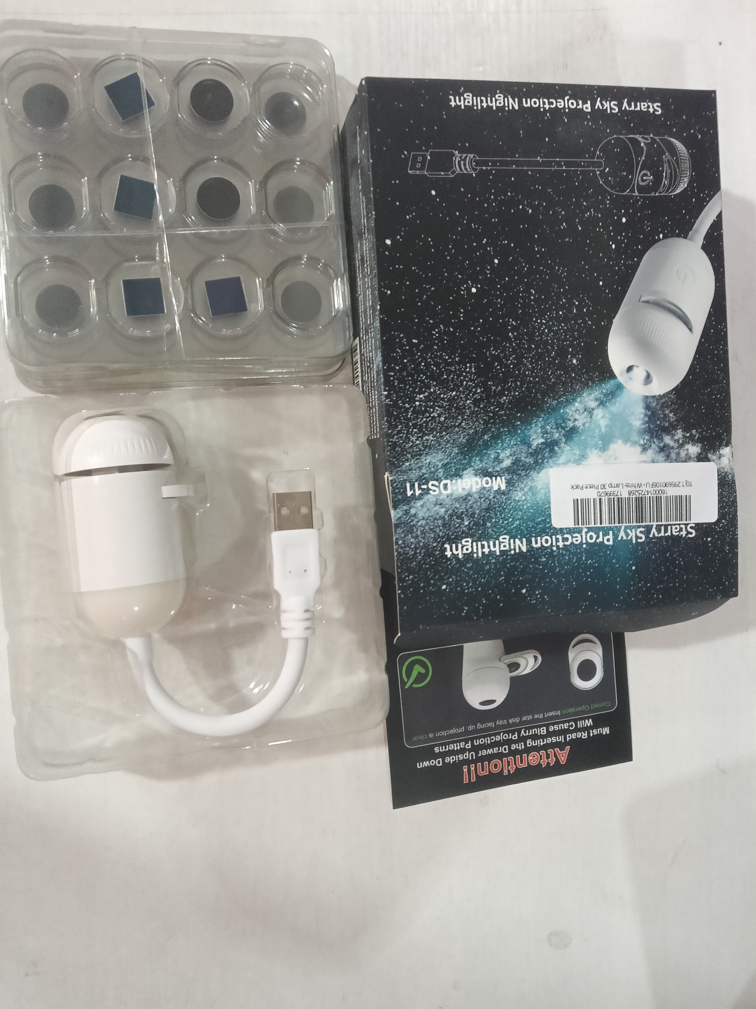 White planet-shaped projector lamp product view