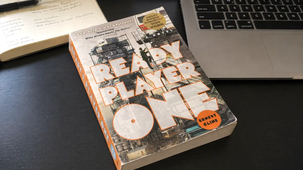 book ready player one review on Zynqle with Ready Player One paperback on a reading desk